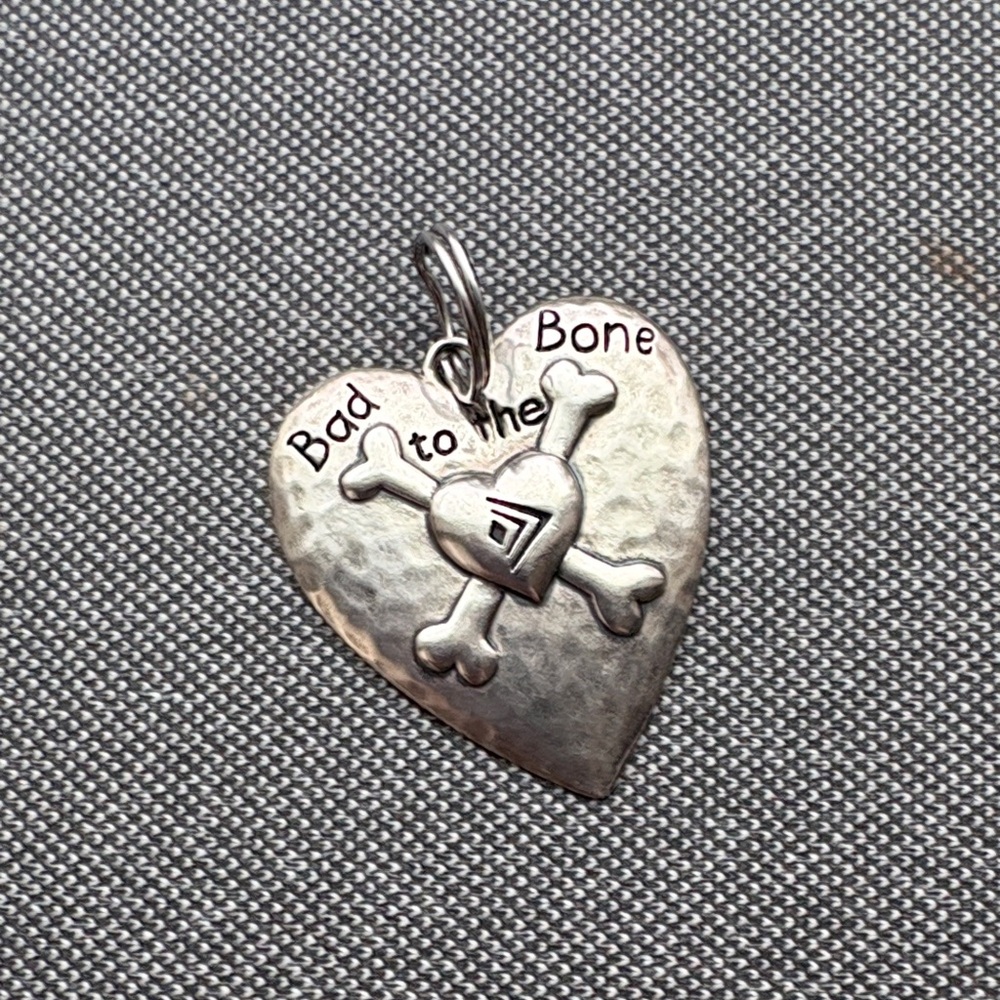 Silver Silpada Bad to the Bone charm. Combine with the silver necklace